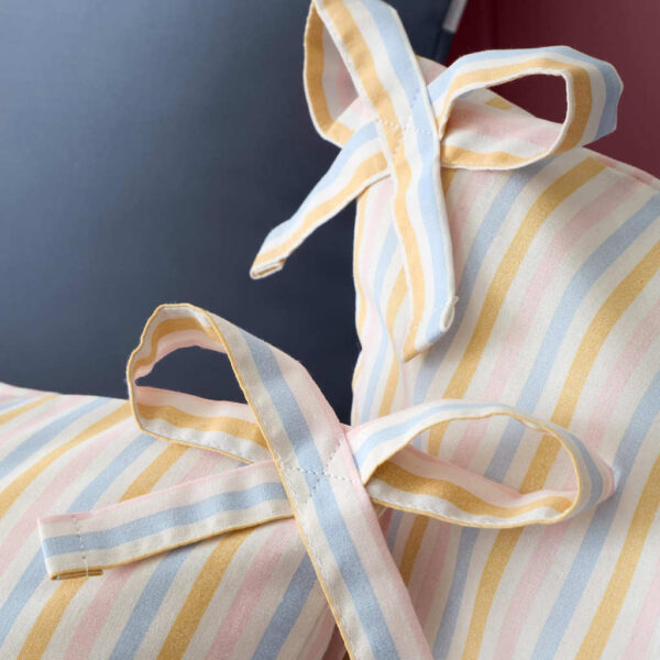 Catherine Lansfield Brighton Stripe Pastel Close Up Image Showing Bows